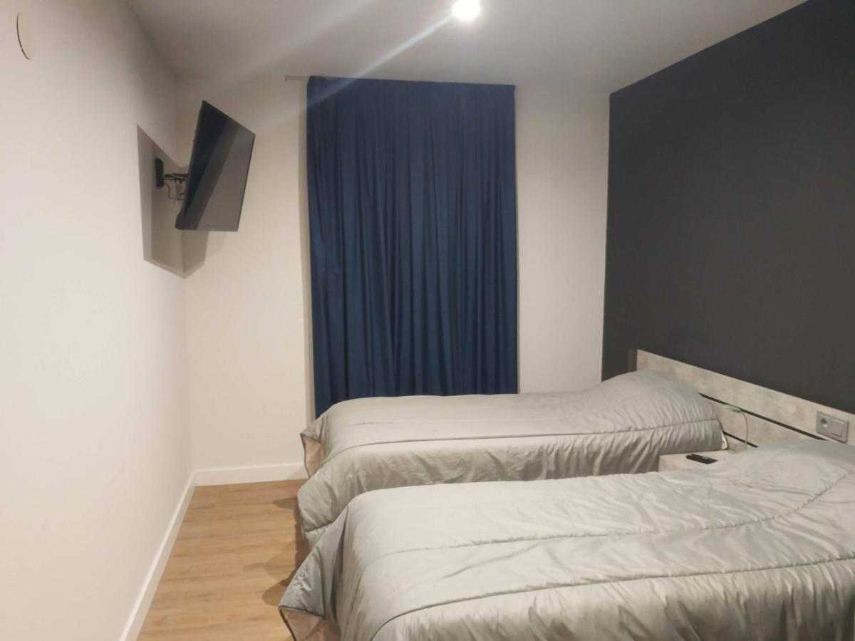 Apartamentos Hi Apartaments Santander 3000 มาลีอันโย ภายนอก รูปภาพ